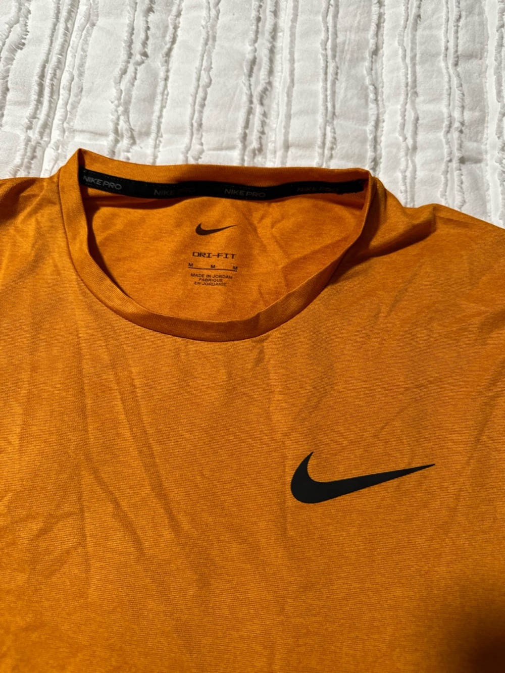 Nike Orange Short-Sleeve Dri-FIT Tee with Black Swoosh